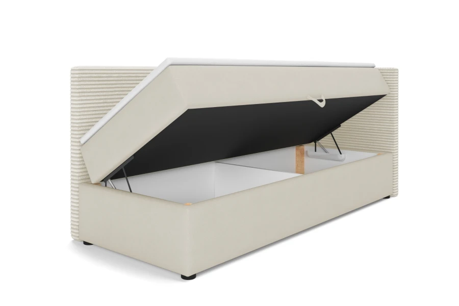 Funktionale Boxspringliege in Beige mit geöffnetem Bettkasten für zusätzlichen Stauraum.
