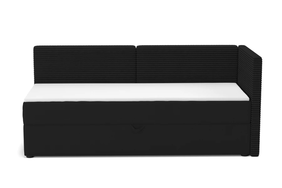 Modernes Boxspring-Eckbett in Schwarz mit Cord-Bezug auf weißem Hintergrund.