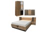 Möbelset in Holzoptik mit schwarzen Akzenten bestehend aus Bett, Schrank und Sideboard.