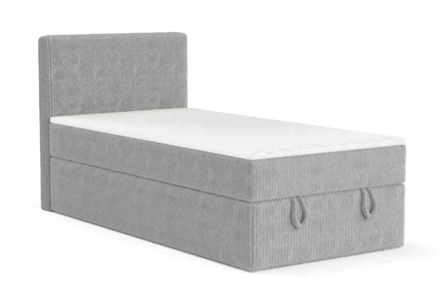 Graues Einzelbett aus Cord-Stoff mit integriertem Stauraum und weißer Matratze.
