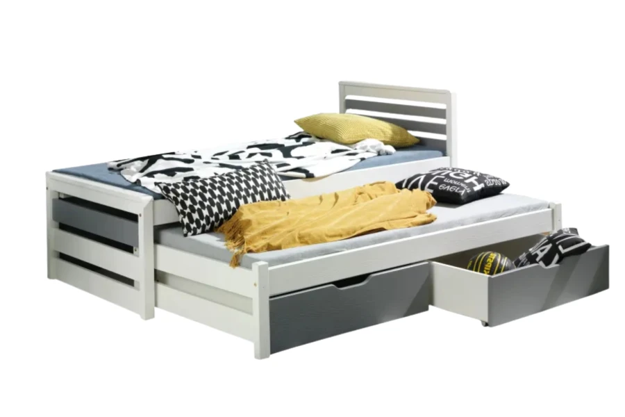 Modernes Jugendbett in Weiß mit grauen Bettkästen und ausziehbarer Schlafgelegenheit.