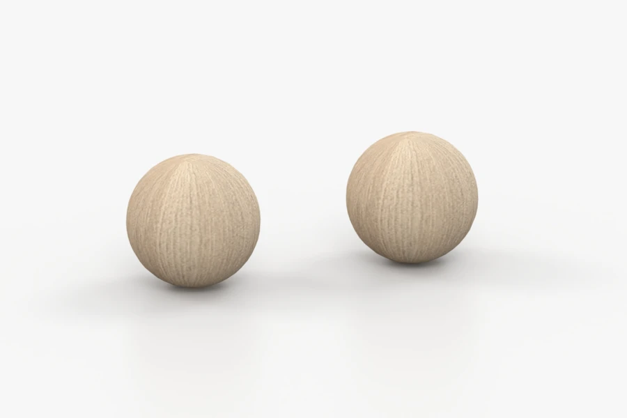 Zwei Holzkugeln als Materialprobe für Eichen-Oberflächen.