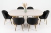 Großes Esszimmer-Set mit ovalem Ausziehtisch und sechs grauen Bouclé-Stühlen.