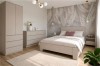 Elegantes Schlafzimmer-Set bestehend aus Bett, Kommode und Kleiderschrank.