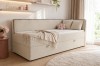 Beiges Gina Kindersofa in gemütlich eingerichtetem Mädchenzimmer.