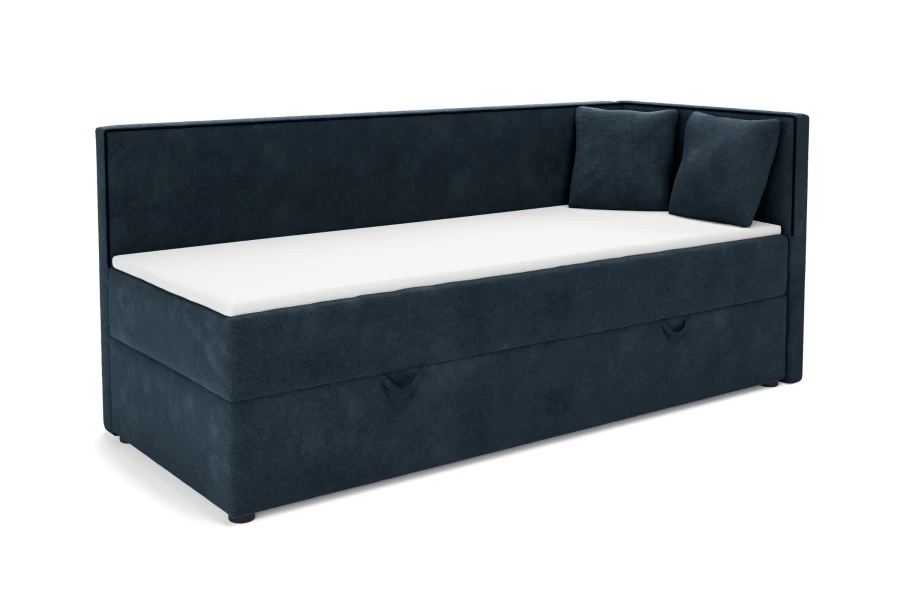 Modernes blaues Ecksofa mit weißer Matratze und zwei passenden Kissen.