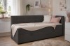 Gemütliches anthrazitfarbenes Daybed mit hellen Kissen im Wohnraum.