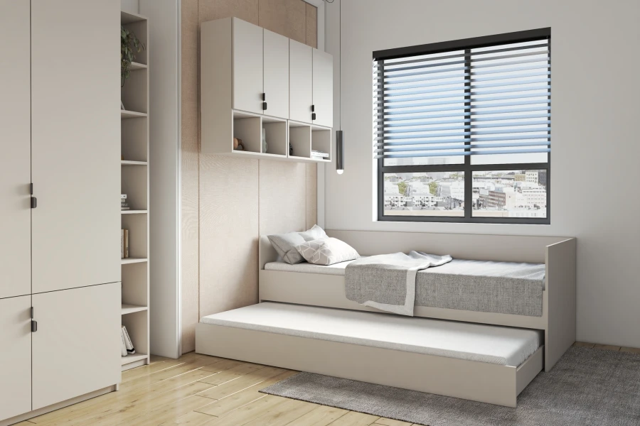 Funktionsbett mit Ausziehfunktion in hellem Grau im modern eingerichteten Zimmer.
