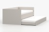 Modernes Funktionsbett in Beige mit ausziehbarer zweiter Liegefläche, Seitenansicht.
