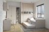 Modern eingerichtetes Jugendzimmer mit ausziehbarem Gästebett, Schreibtisch und großem Kleiderschrank.