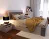 Gemütliches Schlafzimmer-Set mit Doppelbett, Nachttisch und moderner Beleuchtung in warmen Tönen.