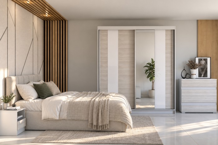 Modernes Heaven Schlafzimmer mit Schwebetürenschrank, Kommode und gemütlichem Bett in Naturtönen.