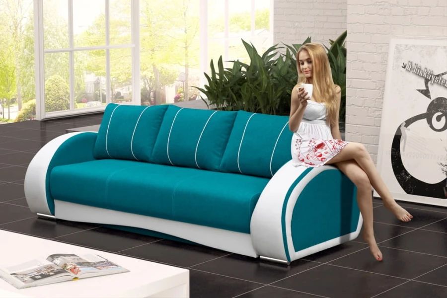 Stilvolles türkisfarbenes Sofa mit weißen Details für modernes Wohnen.
