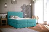 Türkisblaues Boxspringbett mit elegantem Rautenmuster in modernem Ambiente.