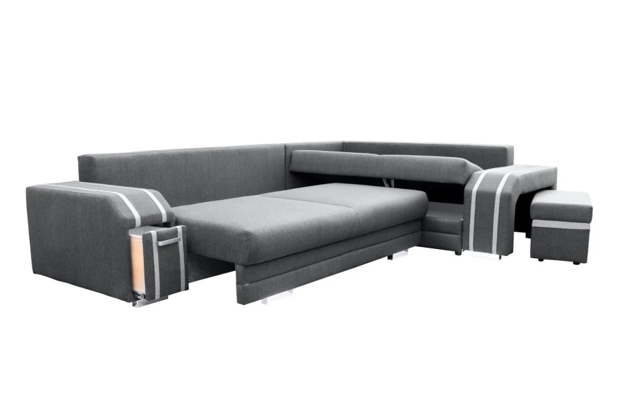 Ausziehbares Ecksofa mit Schlaffunktion, Bettkasten und praktischem Zubehör.
