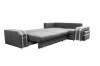 Ausgeklapptes Schlafsofa in Grau mit integrierter Gästebett-Funktion.