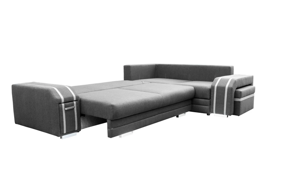 Ausgeklapptes Schlafsofa in Grau mit integrierter Gästebett-Funktion.